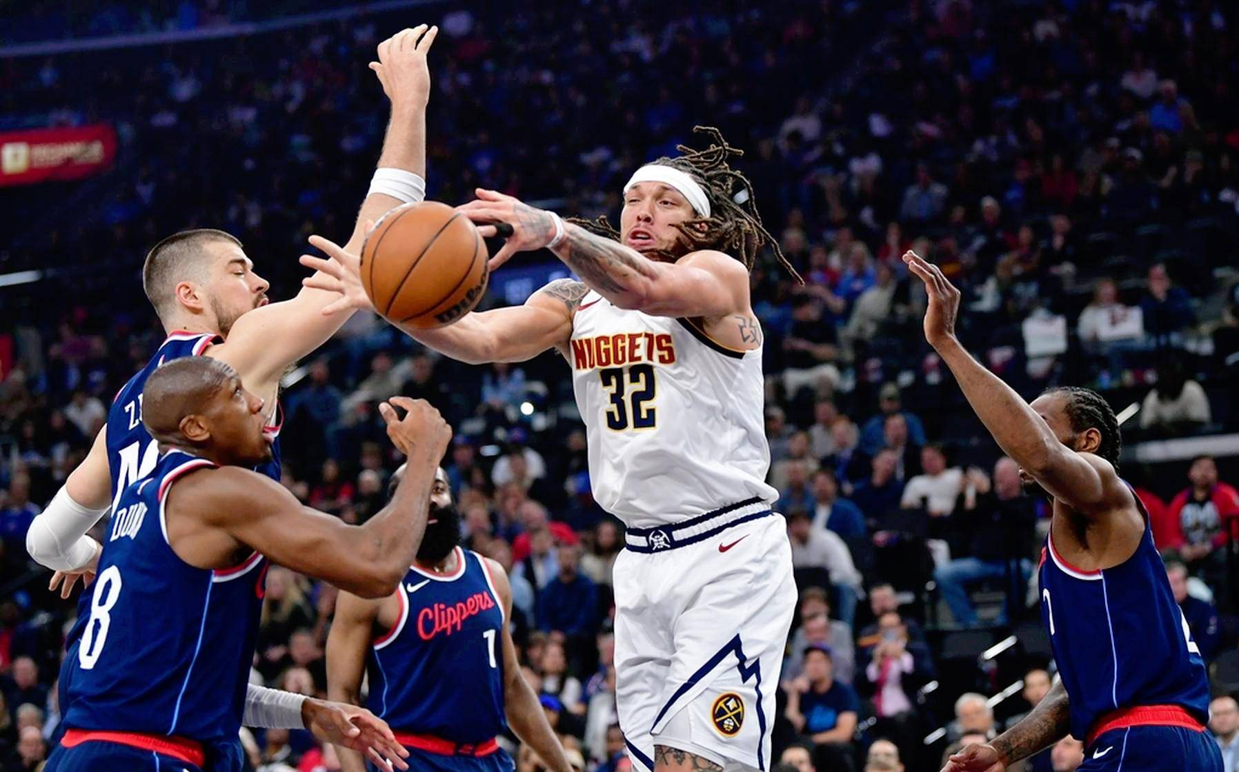 韦德最新地址-快船取得对掘金的胜利